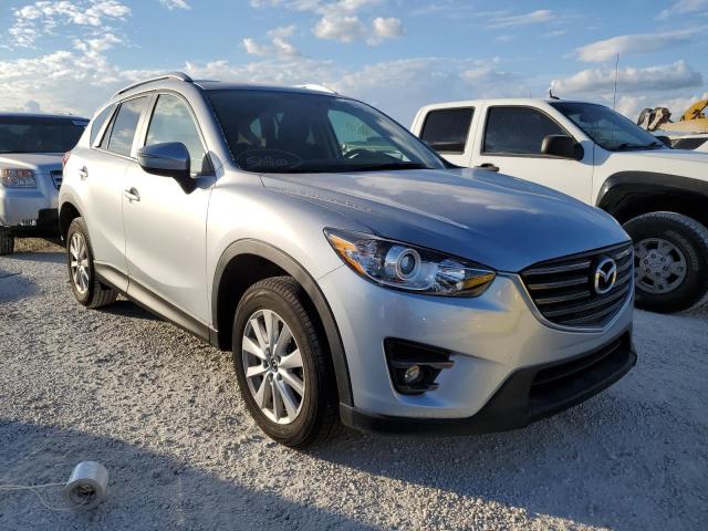 MAZDA CX-5 TOURI 2016 with VIN JM3KE2CY6G0891050 - Photo from auction