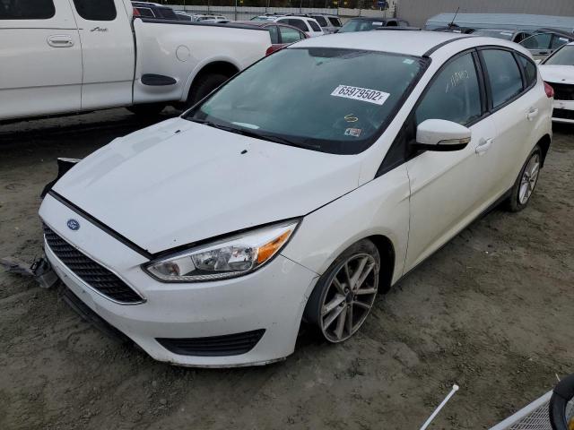 Foto 2 de la subasta – 2016 FORD FOCUS SE con VIN 1FADP3K21GL225958