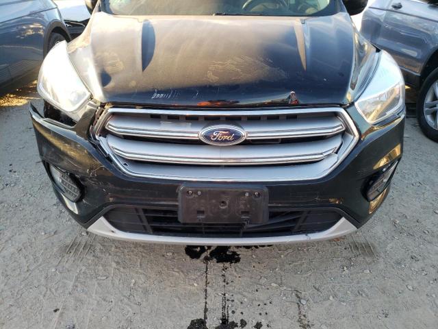 Photo 9 from auction – 2017 FORD ESCAPE SE with VIN 1FMCU9GD1HUA97904
