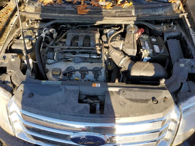 Photo 7 from auction – 2008 FORD TAURUS X S with VIN 1FMDK02W98GA25443