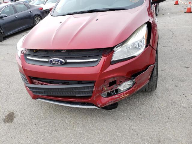 Foto 9 de la subasta – 2014 FORD ESCAPE SE con VIN 1FMCU0G98EUE24656