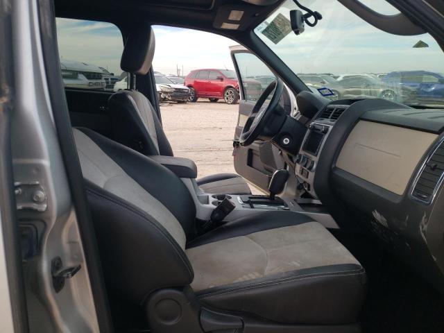 Photo 5 from auction – 2009 MERCURY MARINER PR with VIN 4M2CU87709KJ13607