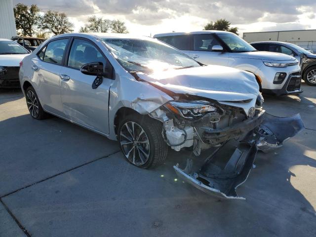 TOYOTA COROLLA L 2018 with VIN 5YFBURHE8JP801123 - Photo from auction