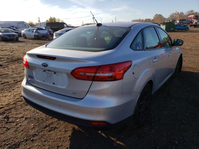 Photo 4 from auction – 2016 FORD FOCUS SE with VIN 1FADP3F22GL321219