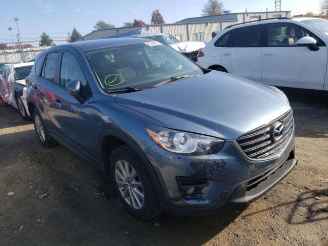MAZDA CX-5 TOURI 2016 with VIN JM3KE4CY3G0803924 - Photo from auction