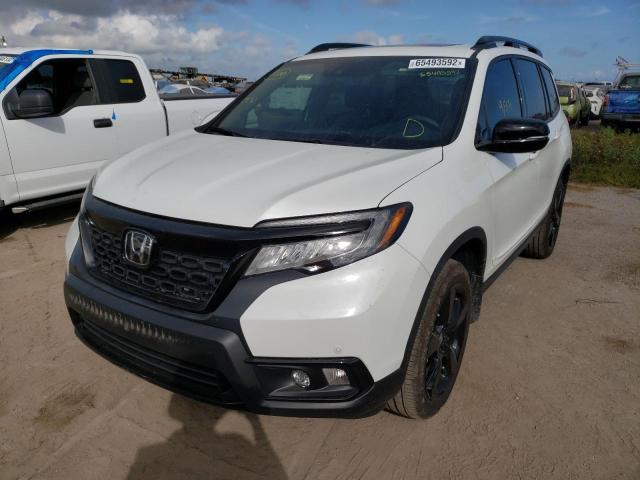 Photo 2 from auction – 2021 HONDA PASSPORT E with VIN 5FNYF8H04MB017508