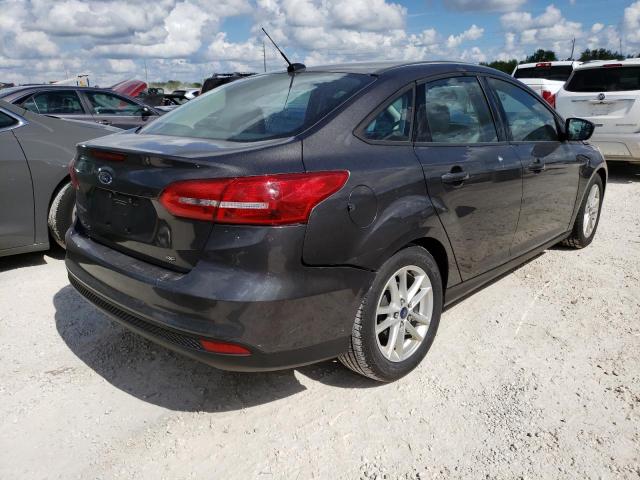Photo 4 from auction – 2015 FORD FOCUS SE with VIN 1FADP3F25FL310956