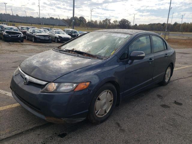 Photo 2 from auction – 2006 HONDA CIVIC HYBR with VIN JHMFA36206S005258