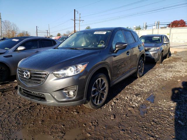 Photo 2 from auction – 2016 MAZDA CX-5 GT with VIN JM3KE4DYXG0778423