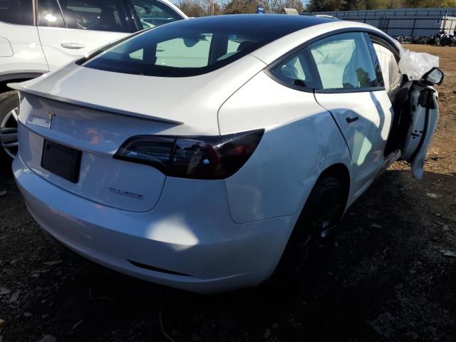 Photo 4 from auction – 2021 TESLA MODEL 3 with VIN 5YJ3E1ECXMF056154