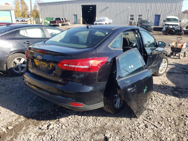 Photo 4 from auction – 2018 FORD FOCUS SE with VIN 1FADP3F23JL248613