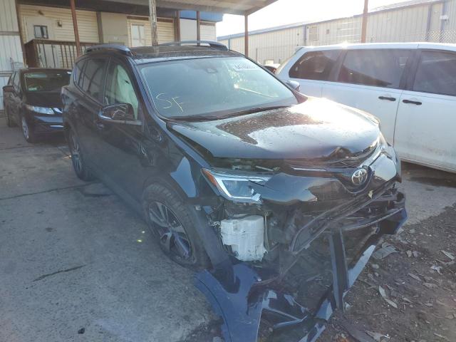 TOYOTA RAV4 XLE 2017 with VIN JTMRFREV1HJ712232 - Photo from auction