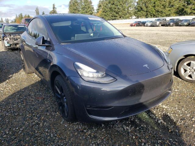 TESLA MODEL Y 2021 with VIN 5YJYGAEE1MF286876 - Photo from auction