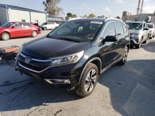 Photo 2 from auction – 2016 HONDA CR-V TOURI with VIN 5J6RM3H93GL012940