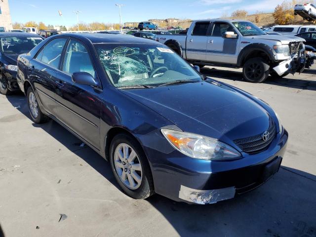 TOYOTA CAMRY LE 2002 with VIN JTDBF30K120039547 - Photo from auction