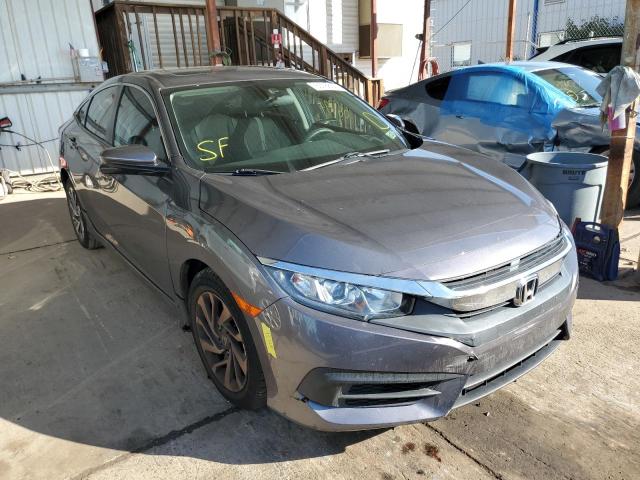 HONDA CIVIC EX 2018 with VIN 2HGFC2F70JH540237 - Photo from auction