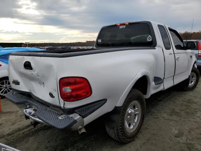 Photo 4 from auction – 2000 FORD 150 with VIN 2FTRX08L1XCA82972