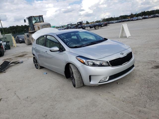 KIA FORTE EX 2017 with VIN 3KPFL4A84HE093962 - Photo from auction