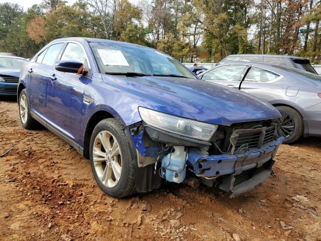 FORD TAURUS SEL 2014 with VIN 1FAHP2E8XEG151067 - Photo from auction