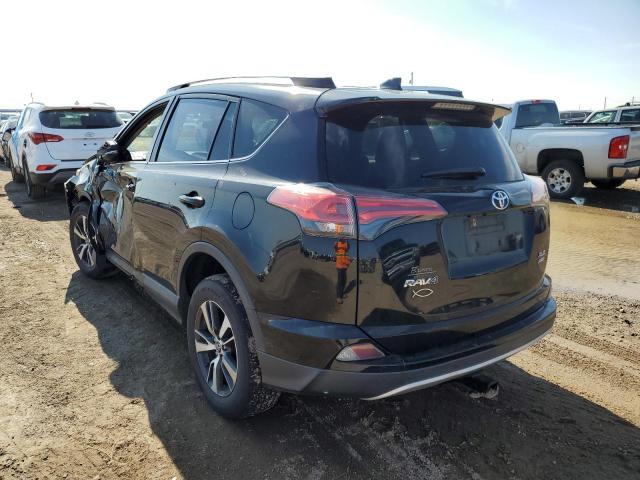Photo 3 from auction – 2016 TOYOTA RAV4 XLE with VIN 2T3RFREV5GW438582