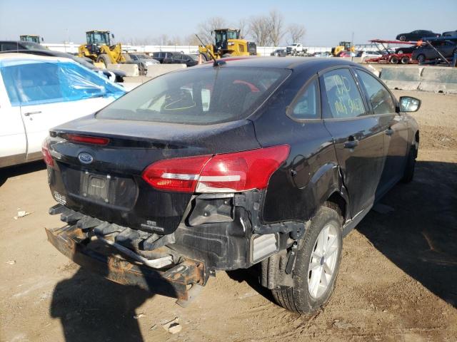 Photo 4 from auction – 2016 FORD FOCUS SE with VIN 1FADP3F2XGL343257