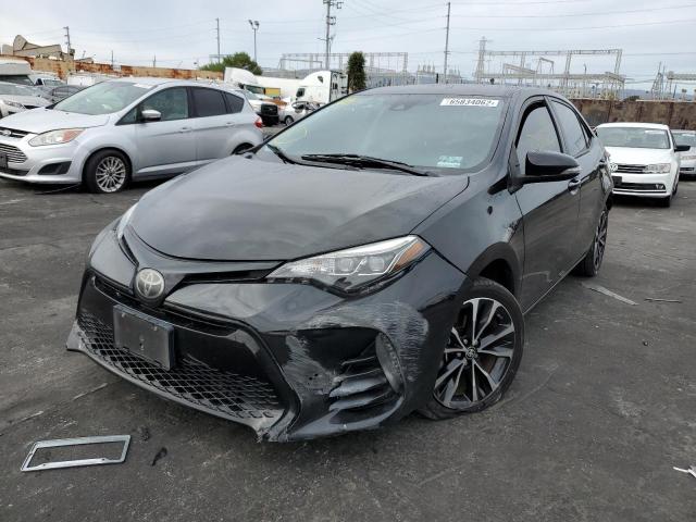 Photo 2 from auction – 2018 TOYOTA COROLLA L with VIN 5YFBURHE0JP817526