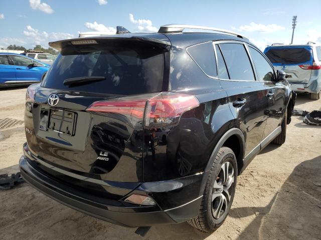 Photo 4 from auction – 2016 TOYOTA RAV4 LE with VIN 2T3BFREV5GW442830