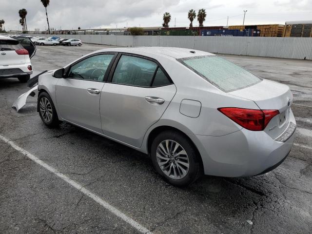 Photo 3 from auction – 2018 TOYOTA COROLLA L with VIN 5YFBURHE2JP800131