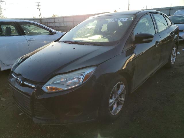 FORD FOCUS SE 2014 con VIN 1FADP3F21EL371803 - Foto de la subasta