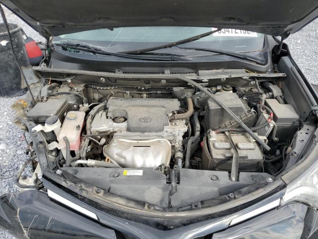 Photo 7 from auction – 2018 TOYOTA RAV4 LE with VIN 2T3ZFREV9JW424174