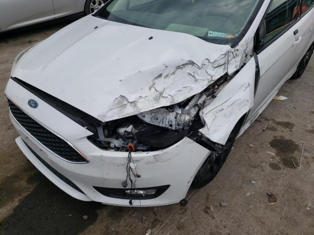Photo 9 from auction – 2016 FORD FOCUS SE with VIN 1FADP3F26GL220510