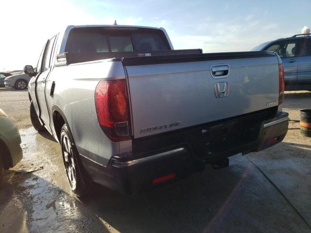 Photo 3 from auction – 2018 HONDA RIDGELINE with VIN 5FPYK3F76JB016359