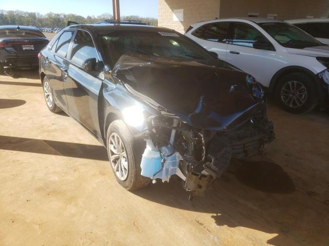 TOYOTA CAMRY LE 2016 with VIN 4T1BF1FK0GU999210 - Photo from auction