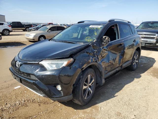 Photo 2 from auction – 2016 TOYOTA RAV4 XLE with VIN 2T3RFREV5GW438582