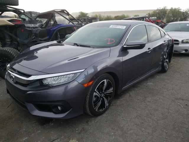 Photo 2 from auction – 2016 HONDA CIVIC TOUR with VIN 19XFC1F97GE008739