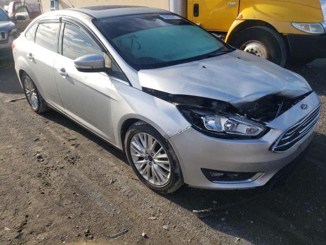 FORD FOCUS TITA 2017 with VIN 1FADP3J27HL279929 - Photo from auction