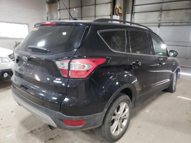Photo 4 from auction – 2018 FORD ESCAPE SE with VIN 1FMCU9GD6JUB73526