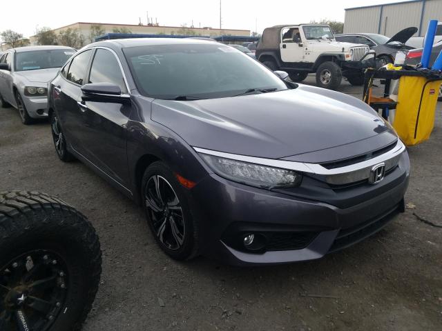 HONDA CIVIC TOUR 2016 with VIN 19XFC1F97GE008739 - Photo from auction