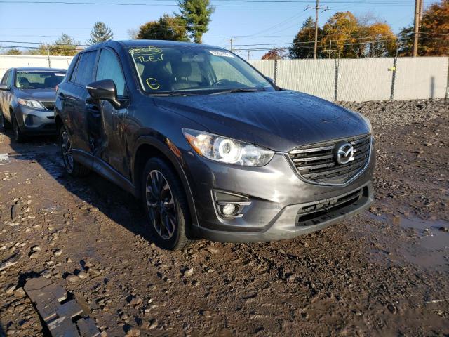 MAZDA CX-5 GT 2016 with VIN JM3KE4DYXG0778423 - Photo from auction