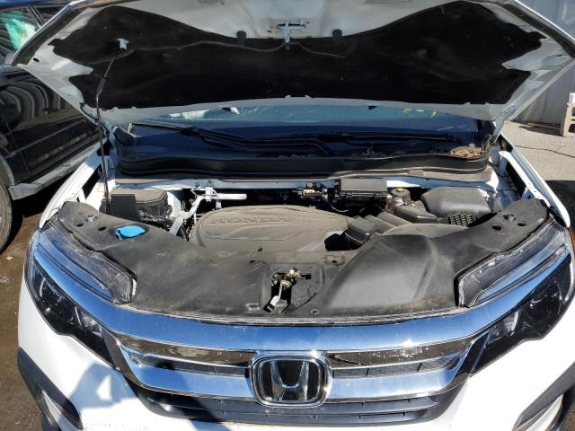 Photo 7 from auction – 2021 HONDA PILOT EXL with VIN 5FNYF5H59MB034041