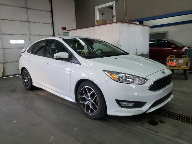FORD FOCUS SE 2018 with VIN 1FADP3F26JL218909 - Photo from auction