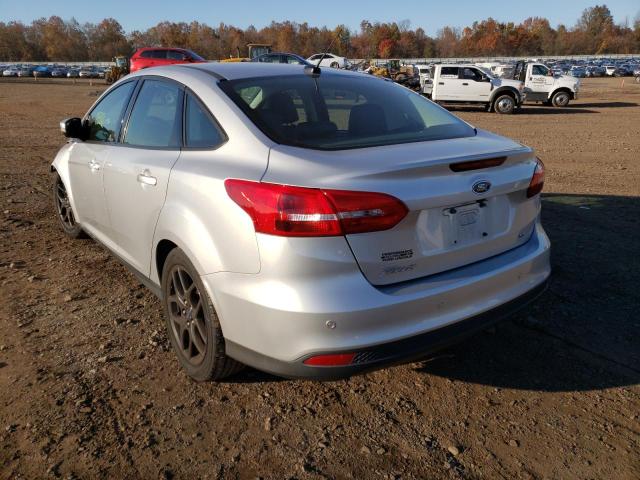 Photo 3 from auction – 2016 FORD FOCUS SE with VIN 1FADP3F22GL321219