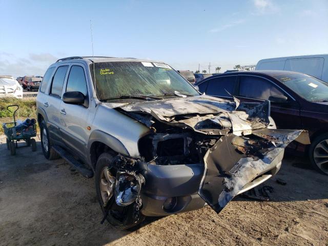 MAZDA TRIBUTE LX 2002 with VIN 4F2YU09122KM11555 - Photo from auction