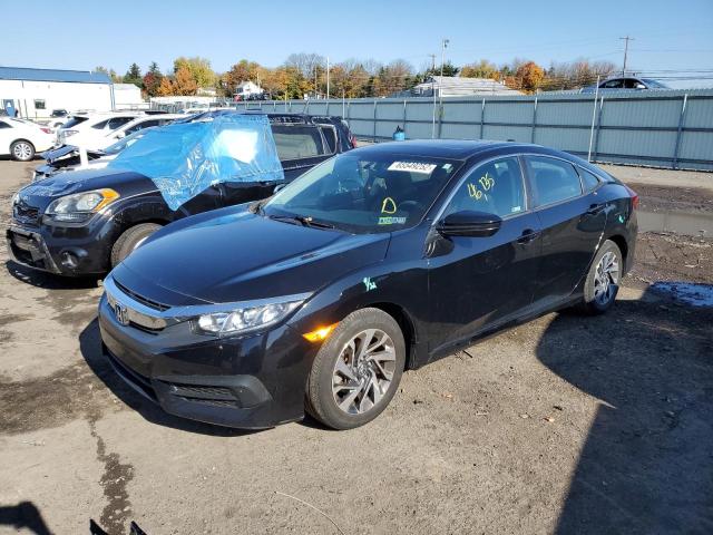 Photo 2 from auction – 2018 HONDA CIVIC EX with VIN 19XFC2F70JE205490