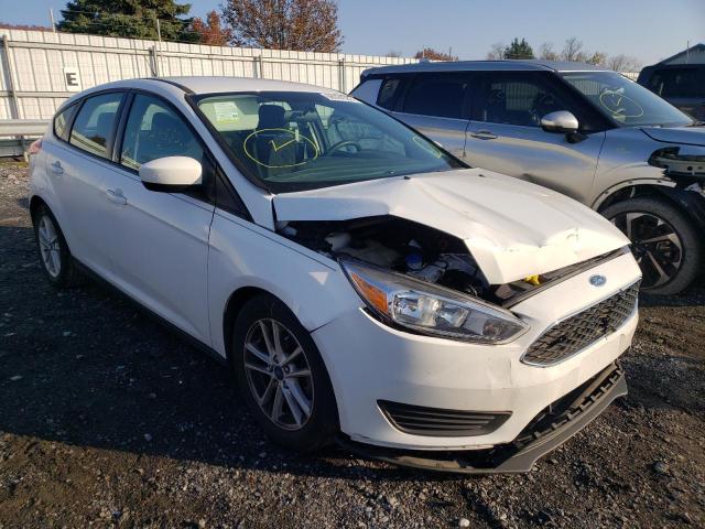 FORD FOCUS SE 2018 with VIN 1FADP3K2XJL280206 - Photo from auction