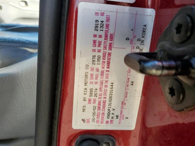 Photo 10 from auction – 2002 KIA SEDONA EX with VIN KNDUP131X26331644