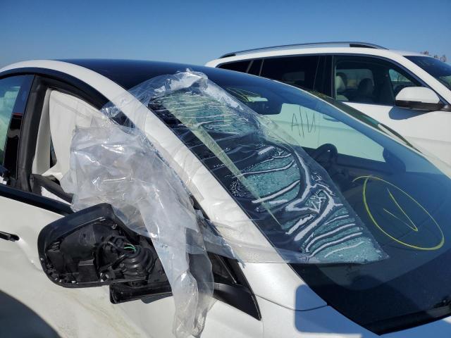 Photo 10 from auction – 2021 TESLA MODEL 3 with VIN 5YJ3E1ECXMF056154