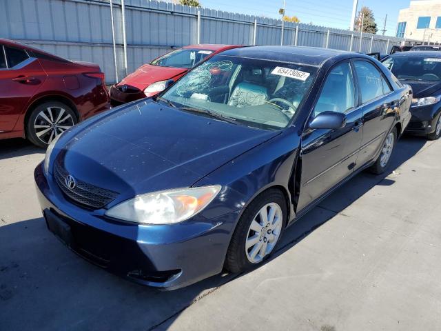 Photo 2 from auction – 2002 TOYOTA CAMRY LE with VIN JTDBF30K120039547
