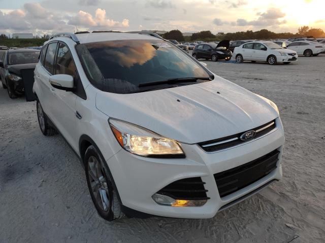 FORD ESCAPE TIT 2016 with VIN 1FMCU0JX8GUB11892 - Photo from auction