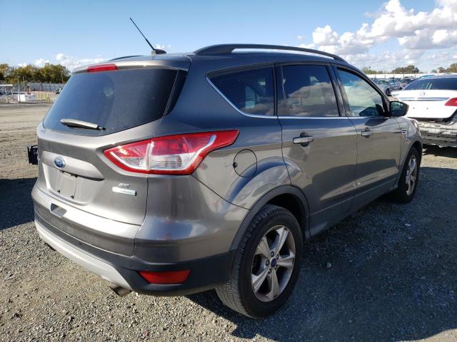 Photo 4 from auction – 2014 FORD ESCAPE with VIN 1FMCU0GX0EUB72643